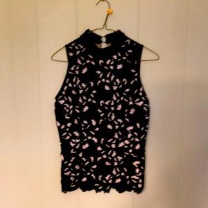 Black lace filigree lined top.
